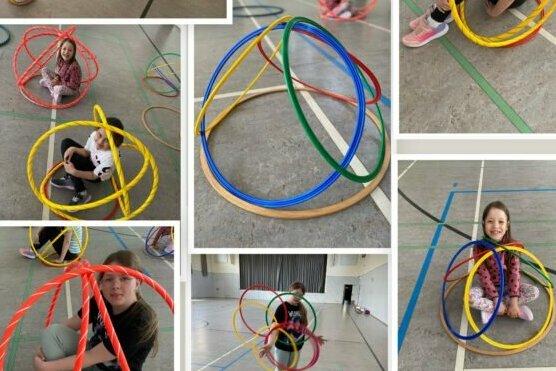 Alles Rund Kinder mit Gymnastikreifen